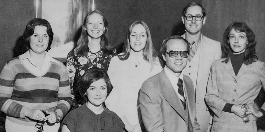 1970's professionals posing for photo